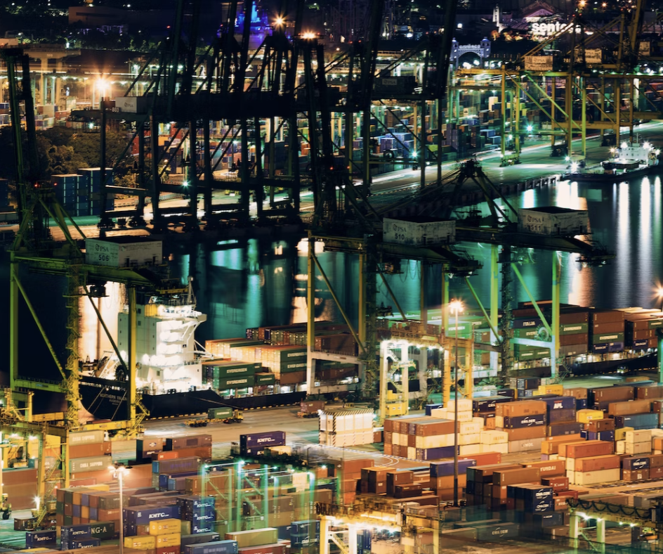 Shipping containers in a port at night