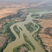 aerial view of braided river on dry lands