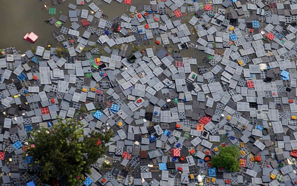 an aerial view of a flooded district just outside Bangkok, Thailand